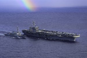 USS Spruance Seen Alongside Stunning Rainbow In Philippine Sea